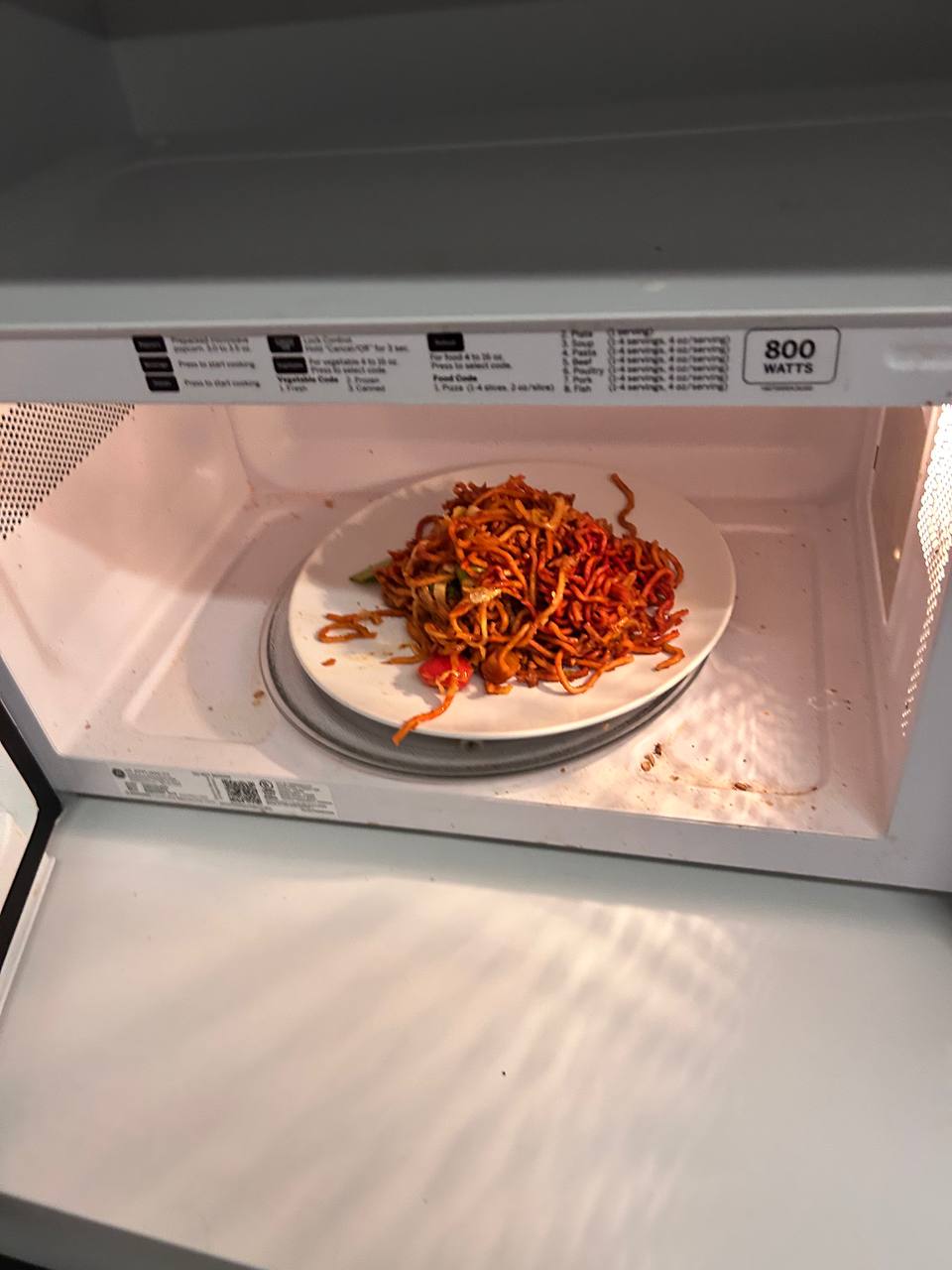 Late night — noodles reheated in a microwave. The startup diet.